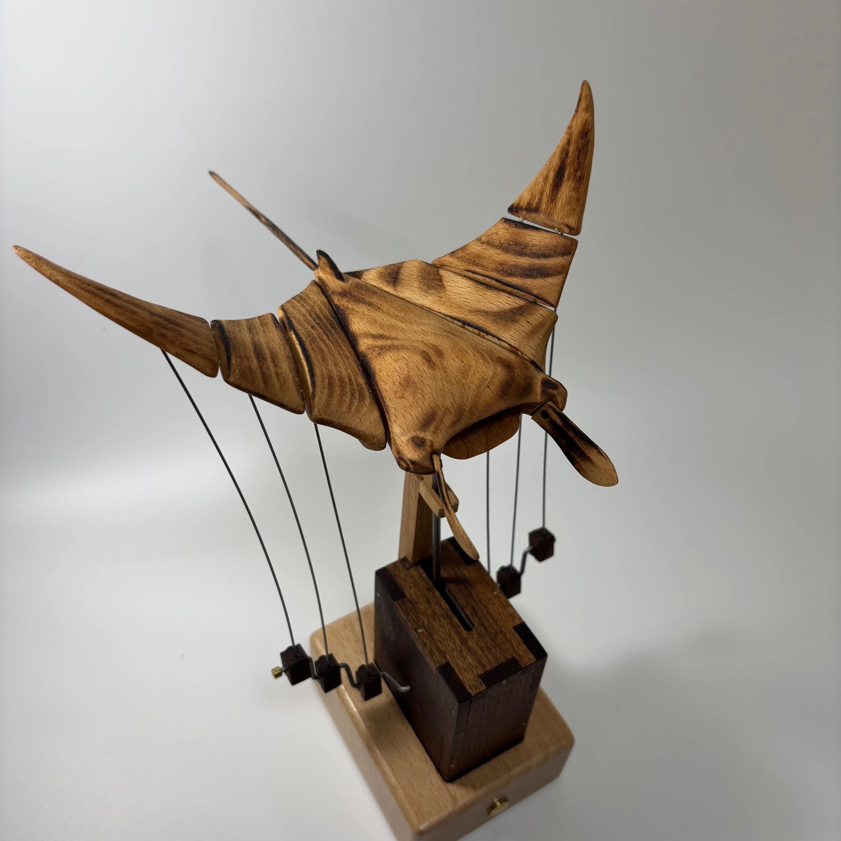 Ocean Majesty: Handcrafted Wooden Manta Ray Automaton